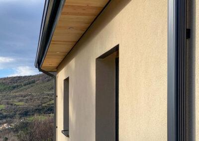 Vue enduit et finition toiture Maison Ossature Bois Darbres