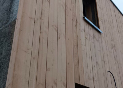 Finition en bardage sur panneaux en béton de chanvre